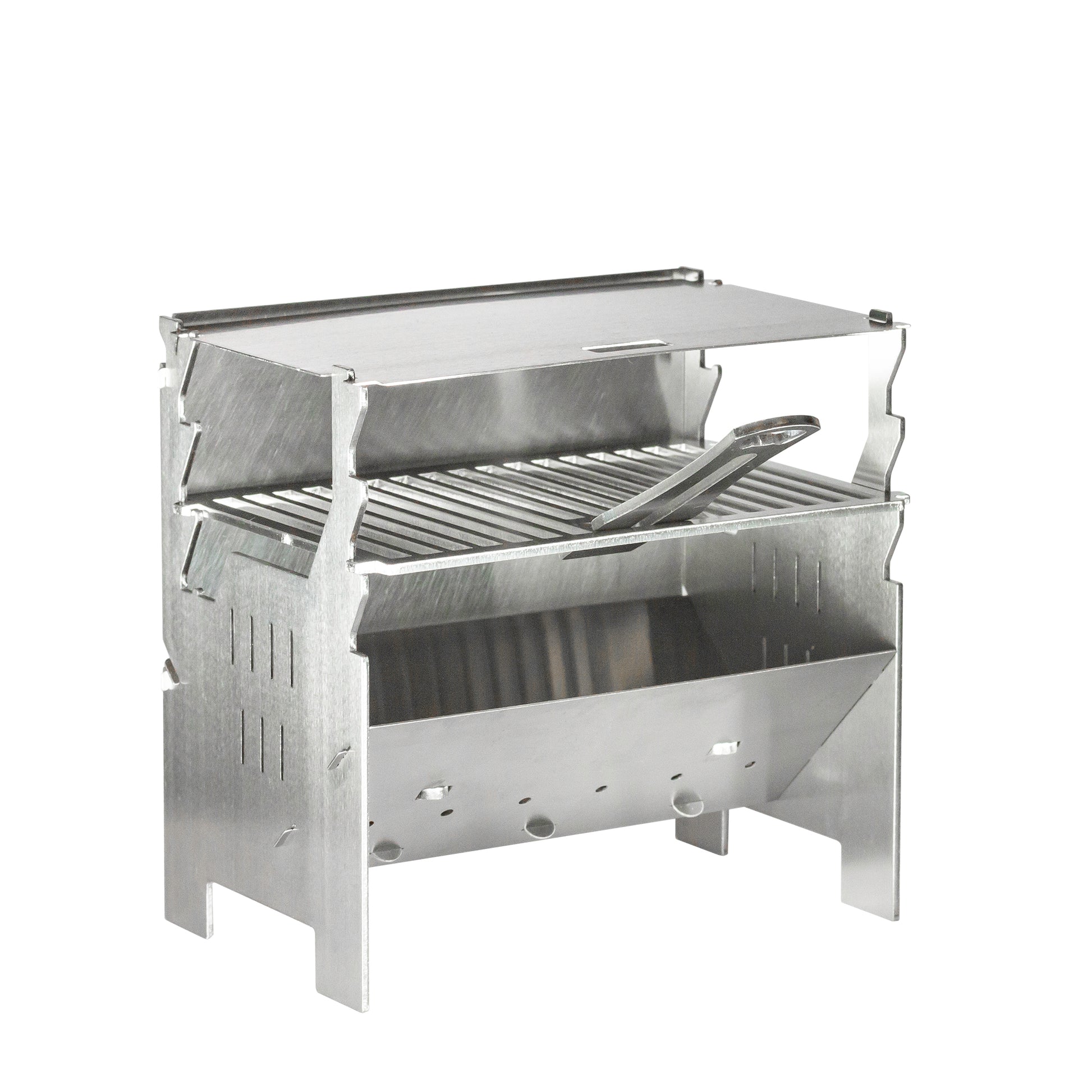 FENNEK Miniatur Grill zum Servieren, aufgebaut mit Griff und Deckel.