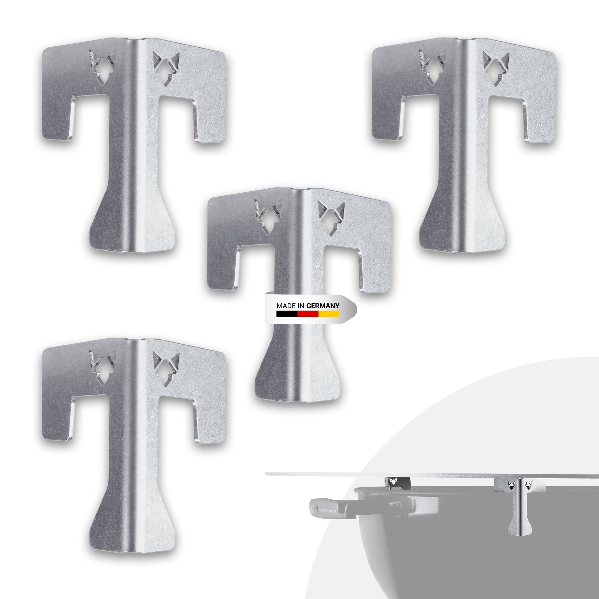 FENNEK Universal Abstandshalter aus Edelstahl - Made in Germany. 4er Set vor weißem HIntergrund.