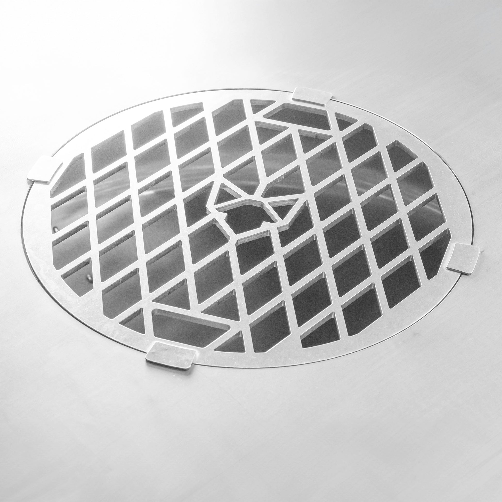 Detailbild vom Grillrost für die FENNEK Feuerplatte.